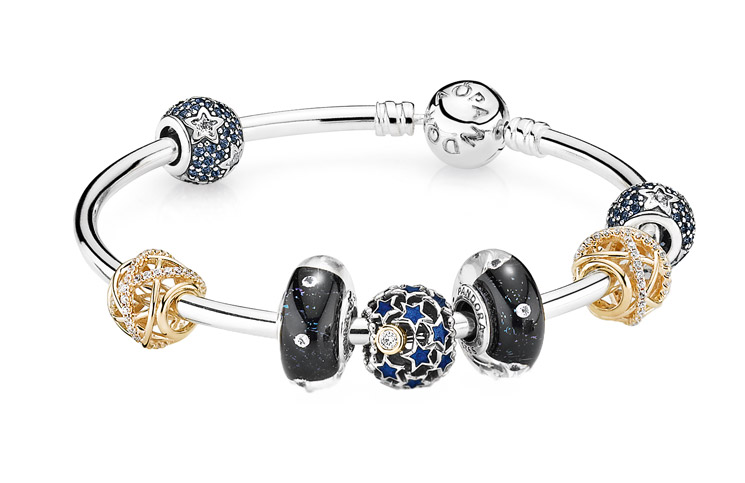 PANDORA sterling silver bangle, $89, sterling silver and cubic zirconia charms, from $99 each, sterling silver and Murano glass charms, $59 each, 14ct gold and cubic zirconia charms, $499 each.