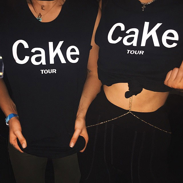 Cara Delevingne and Kendall Jenner show off their matching 'CaKe' (CAra and KEndall) t-shirts at Glastonbury