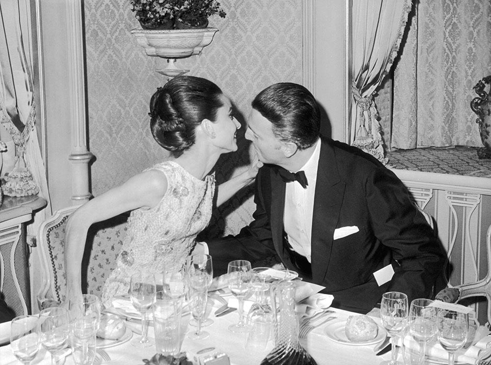 Audrey with Hubert de Givenchy at the My Fair Lady premiere in Paris, 1964.