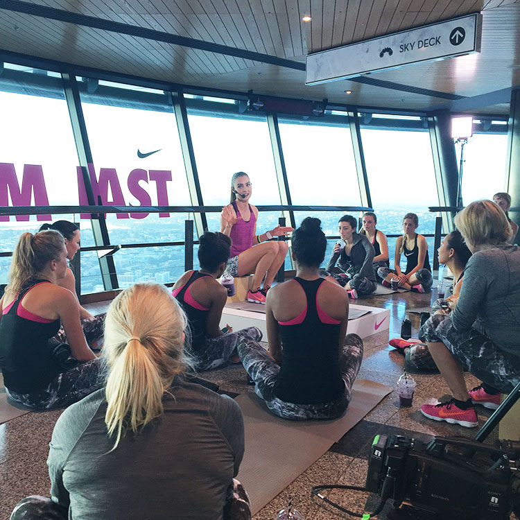 Kirsty Godso talks media through her new Zoomfast workout up the top of Auckland's Sky Tower