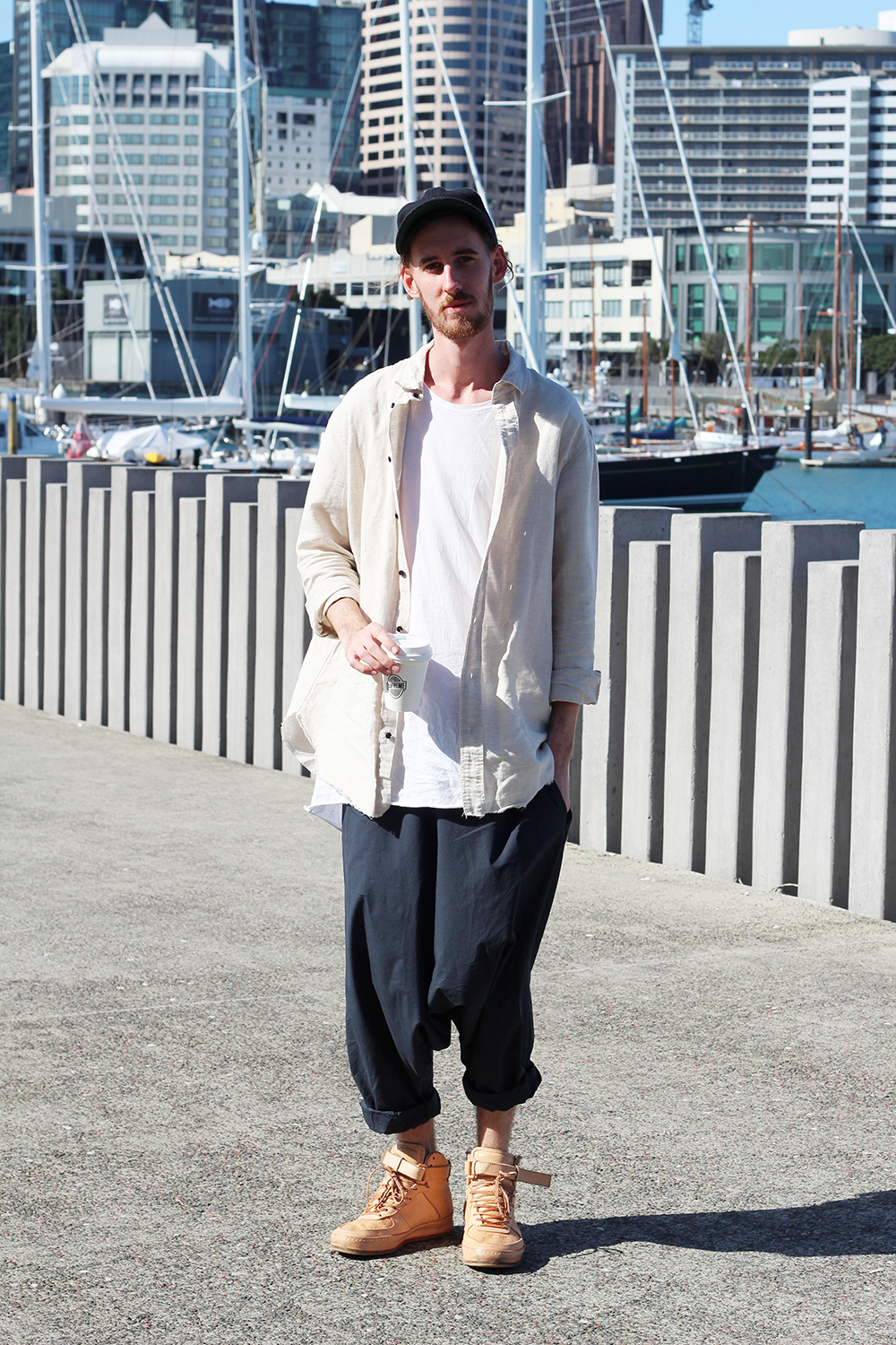 Blake wears Commoners shirt, Commoners t shirt, Bassike pants and Hender Scheme shoes.