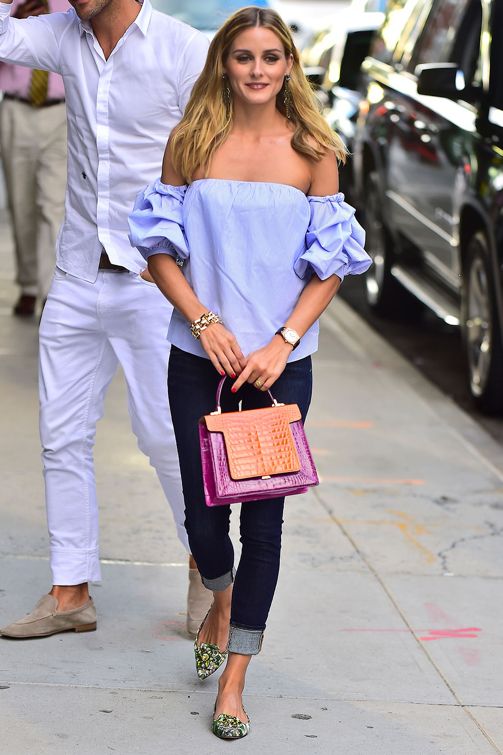 If we could, we'd add Olivia Palermo to our best dressed every week. We love the unexpected bag and shoe combination and the Johanna Ortiz off-the-shoulder top screams summer. Photo / Getty Images