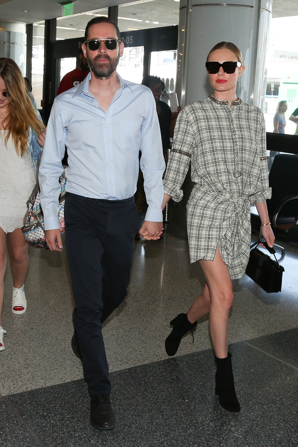 She nails daytime casual too, seen here with husband Michael Polish at LAX. Photo / Getty Images