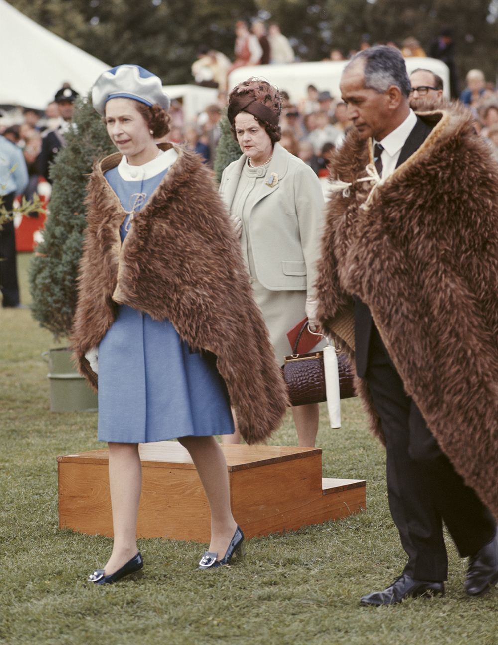 Queen Elizabeth II wears a Maori cloak during her Jubilee Tour of New Zealand in January, 1977. Photo / Getty Images