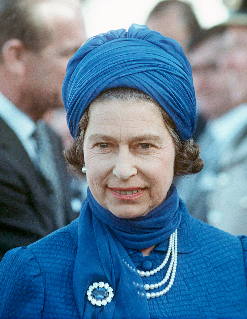 Queen Elizabeth II wears a turban on a visit to Saudi Arabia in Feburary 1979. Photo / Getty Images