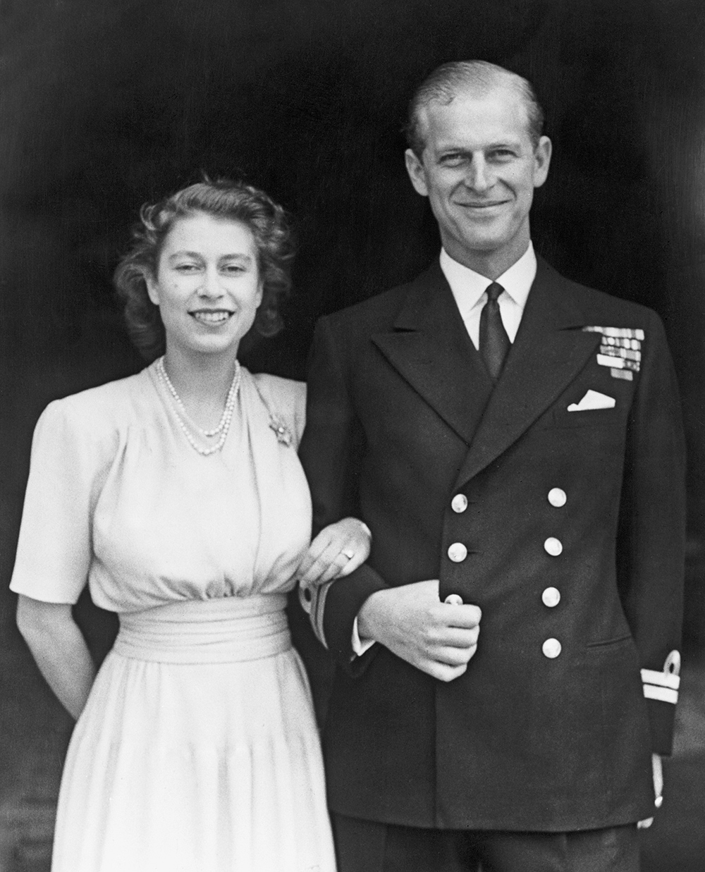 Princess Elizabeth and Prince Philip, Duke of Edinburgh at Buckingham Palace, London shortly after they announced their engagement in July 1947. Photo / Getty Images