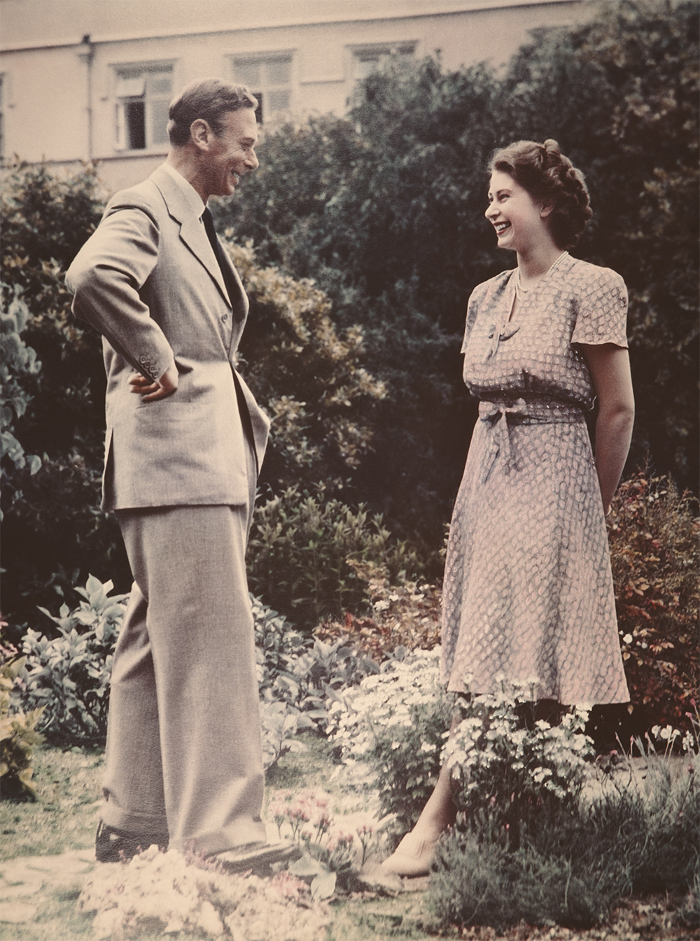 Princess Elizabeth conversing with her father, King George VI in a garden on 8th July 1946. Photo / Getty Images