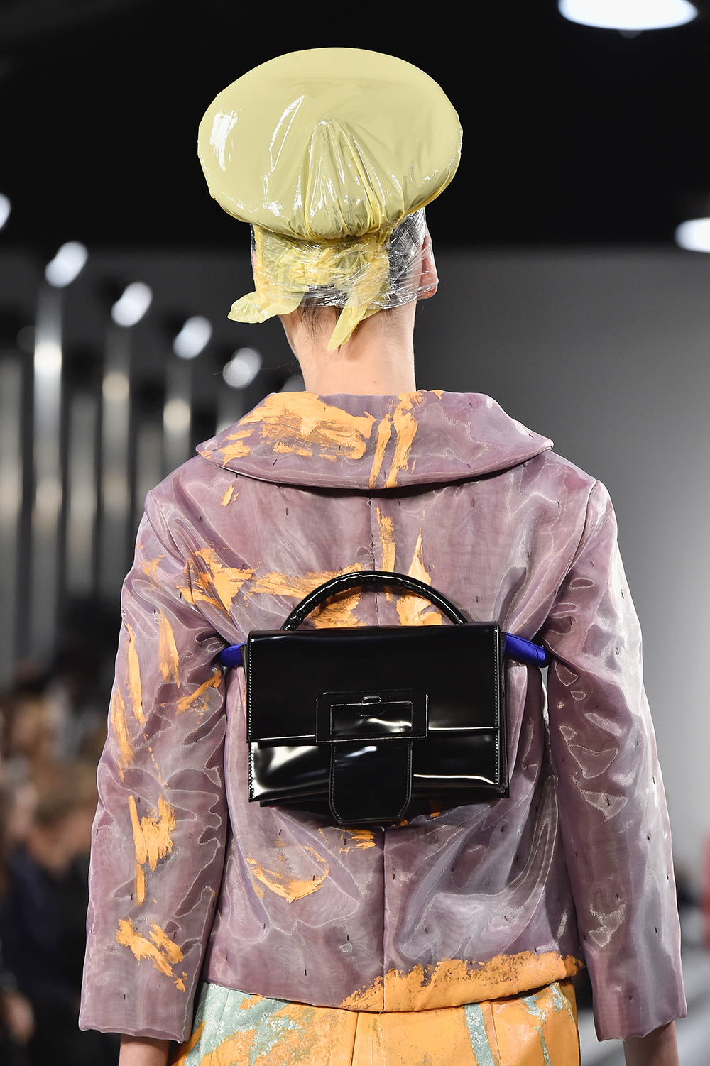 Handbags were also tied and knotted around the rib cage at Margiela. Photo / Getty Images