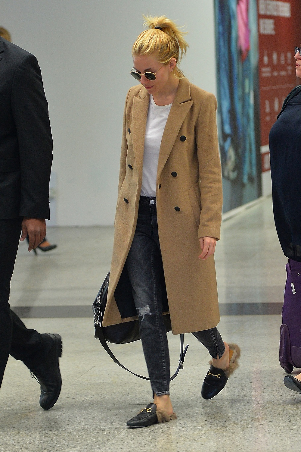 Sienna Miller in a rag&bone coat and Gucci loafers in Rome.