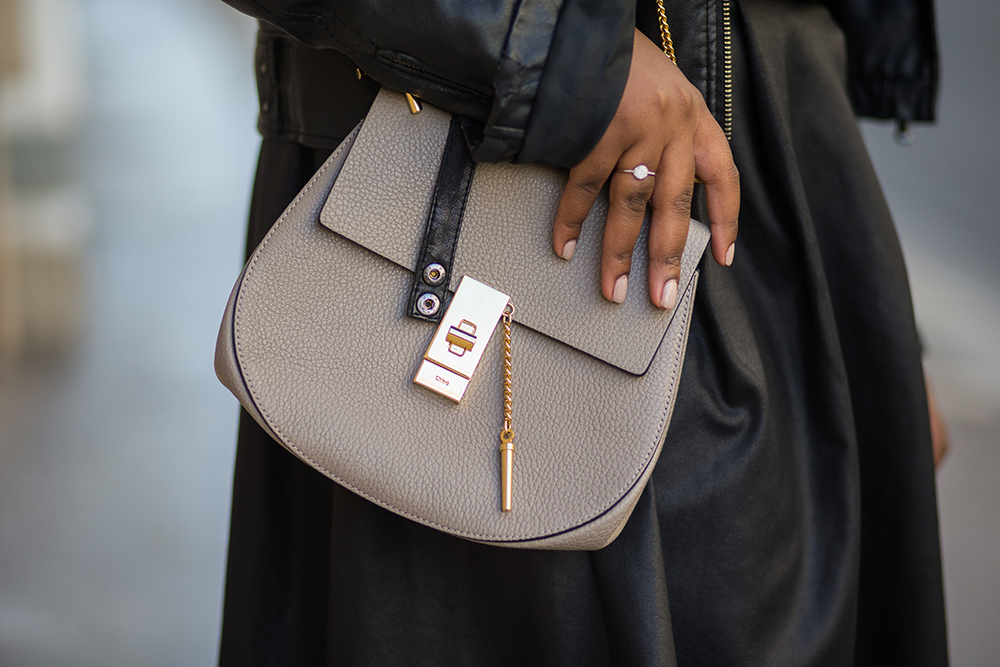 A guest wears a Chloe Drew bag at Paris Fashion Week. Photo / Getty Images