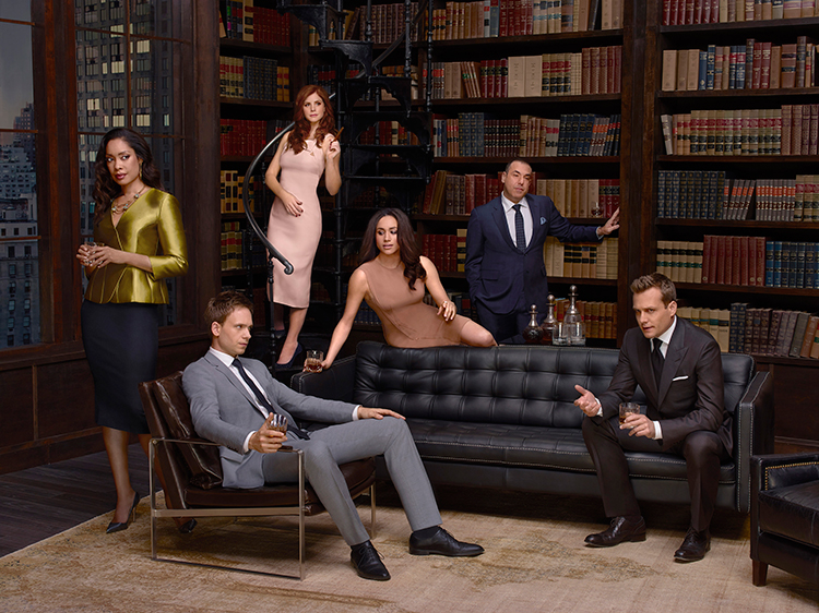 The core Suits cast from above: Mike Ross, Jessica Pearson, Donna Paulsen, Rachel Zane, Louis Litt  and Harvey Specter.