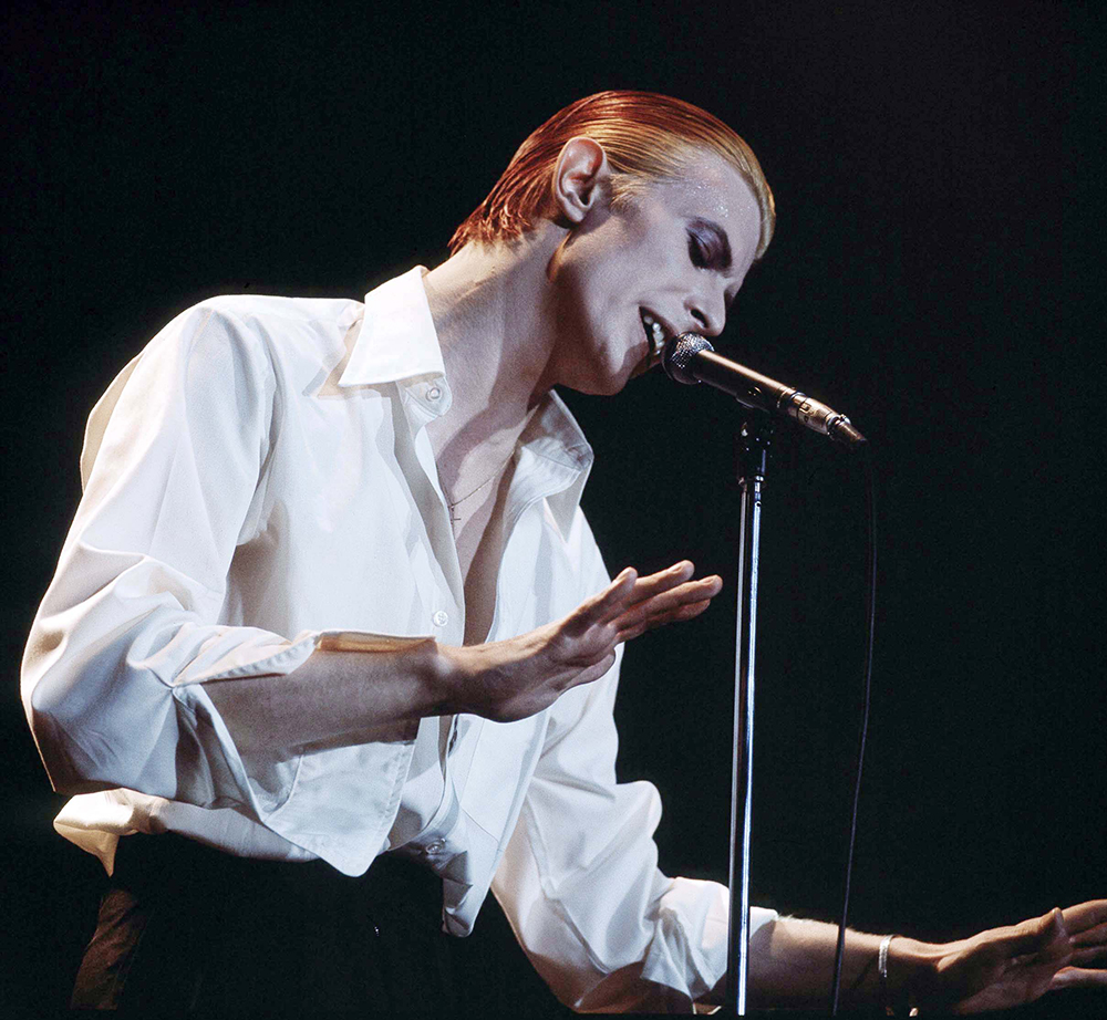 David Bowie performing on stage as the Thin White Duke on his Station To Station World Tour at the Wembley Empire Pool in London, 1976.