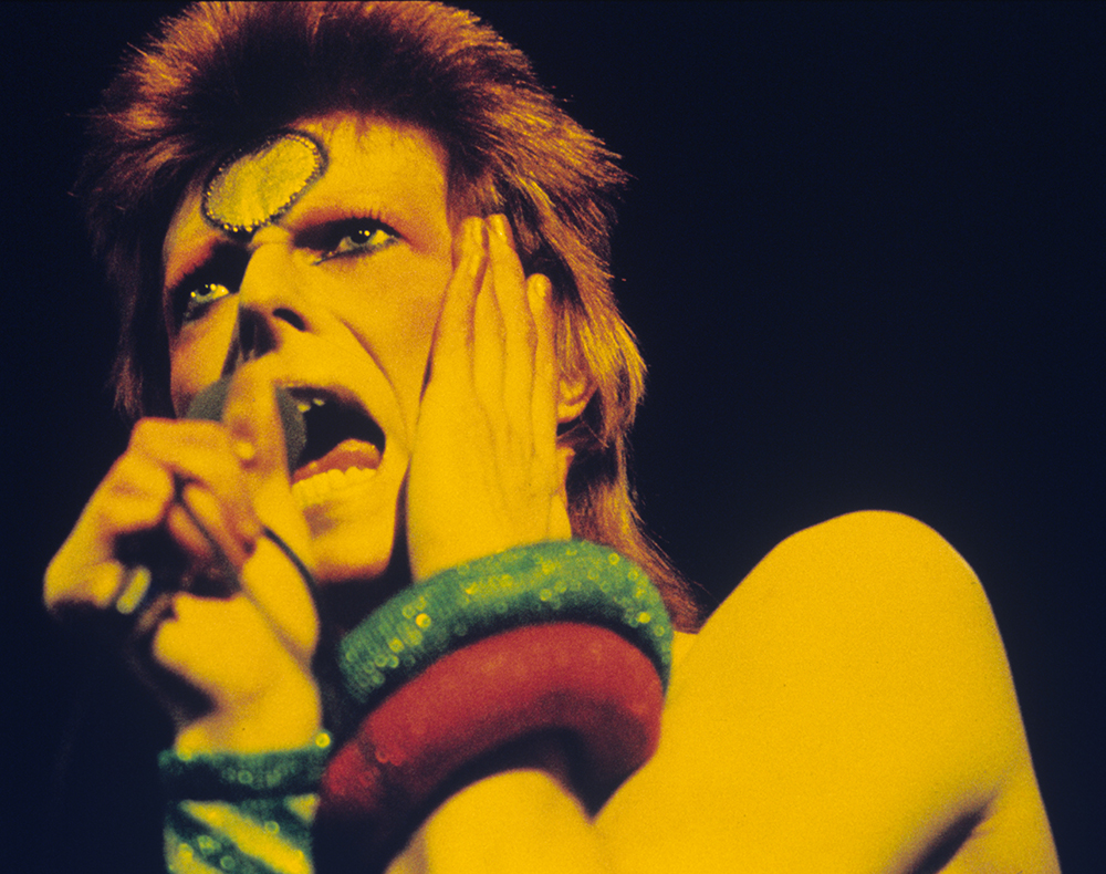 David Bowie performs at Earls Court Arena during the Ziggy Stardust tour in 1973.