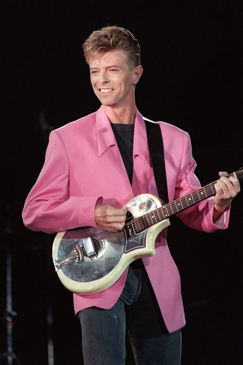 David Bowie performs on stage during a concert organized by NRJ radio station at place de la Nation in Paris in 1991.