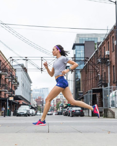 Girl running wearing adidas