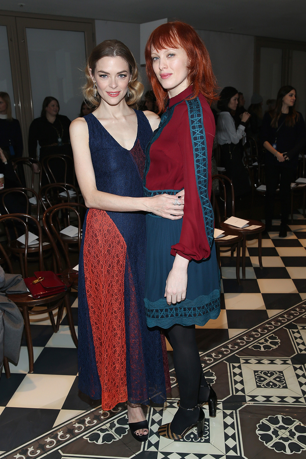 Models Jaime King (L) and Karen Elson before the Tory Burch show.