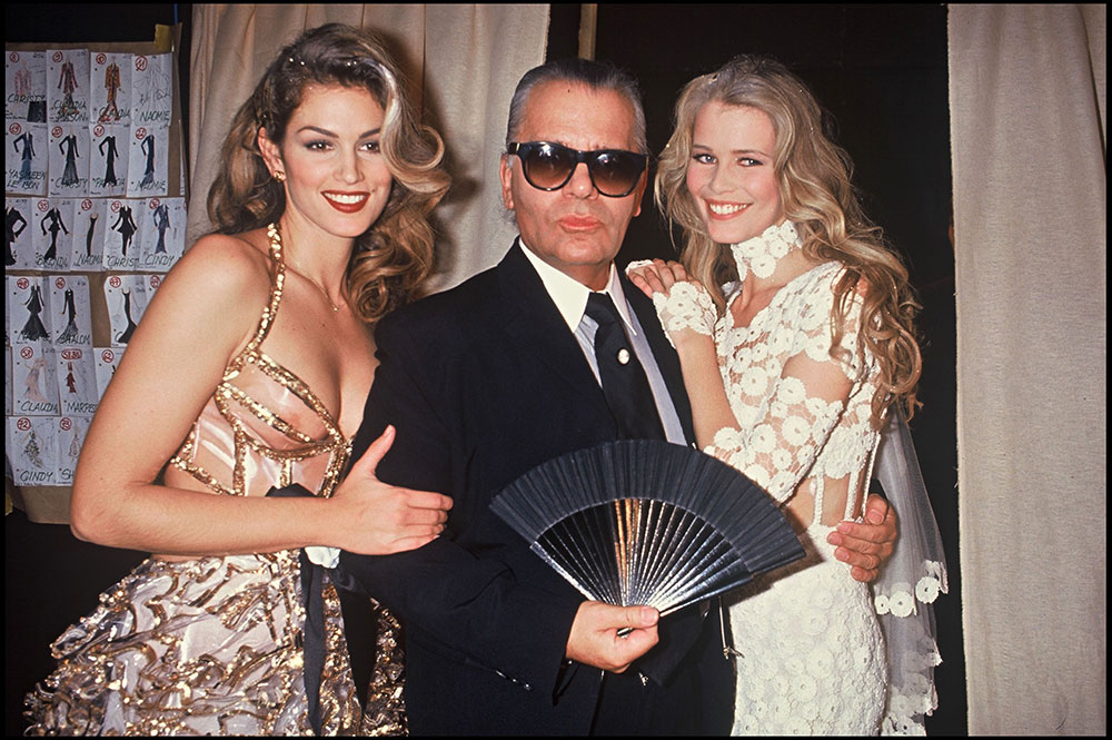 Cindy Crawford, Karl Lagerfeld and Claudia Schiffer during the Chanel fashion show in Paris - 1993.