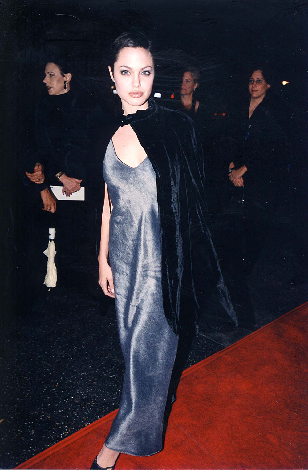 Meanwhile, a pre-Brad Angelina was all about layered velvet, heavy eyeliner and a pixie crop - grungy 90s at its best.