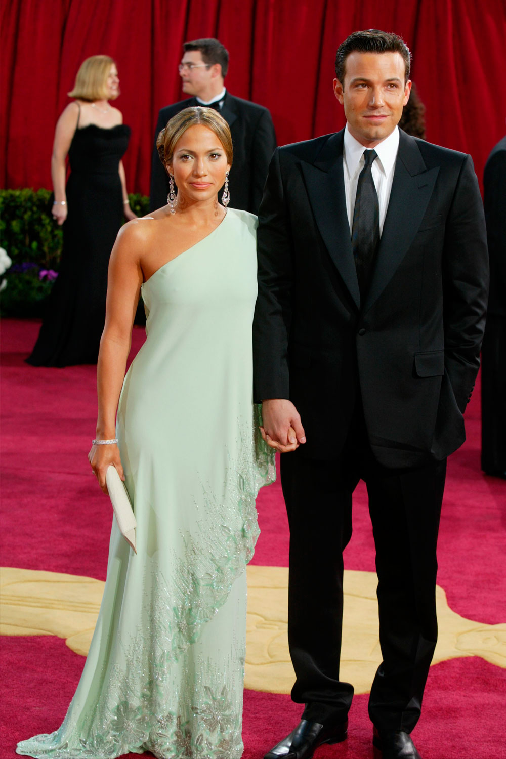 Jennifer Lopez, in Valentino, with Ben Affleck, at the 2003 Academy Awards.
