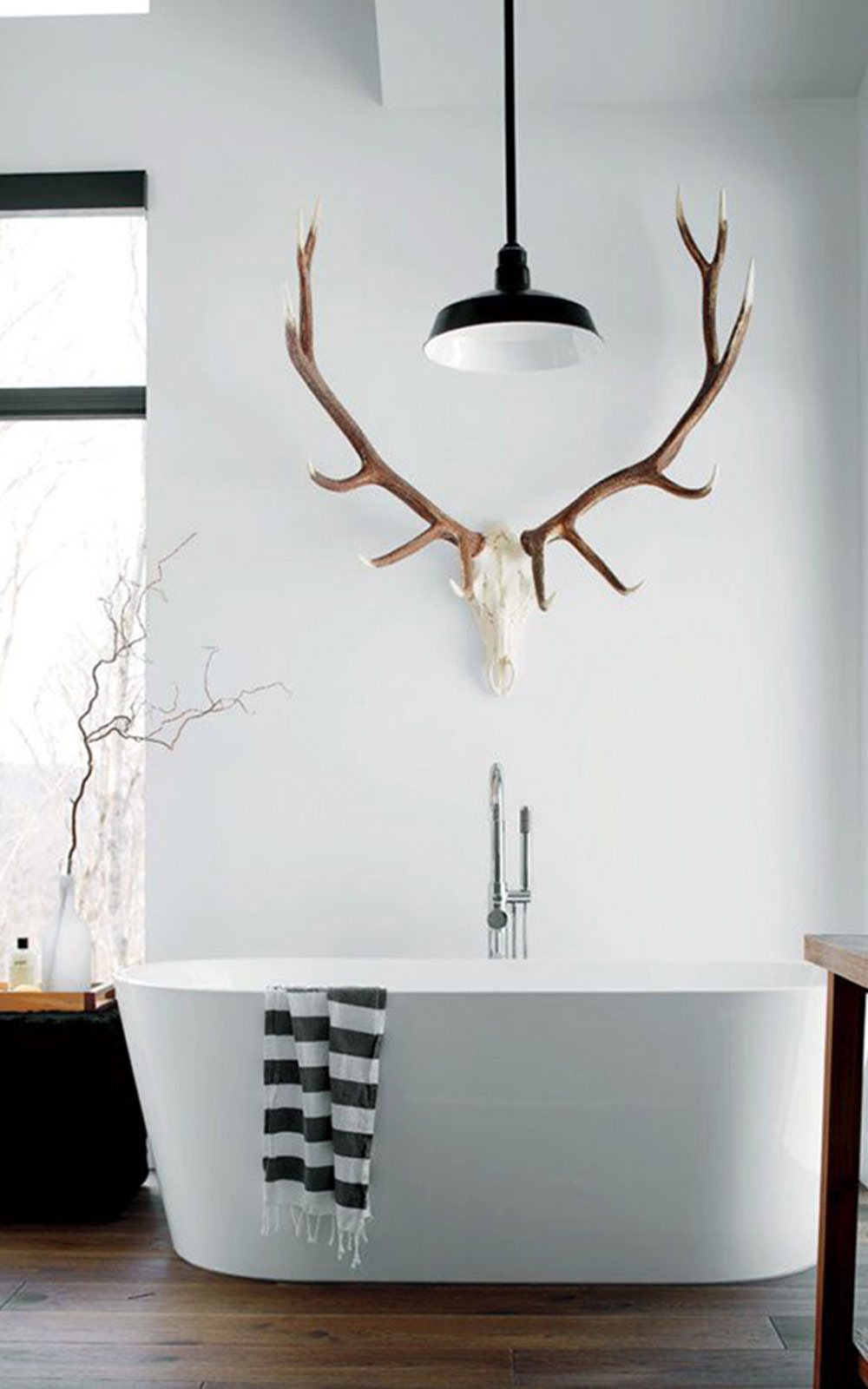 Bathroom with decorative antlers