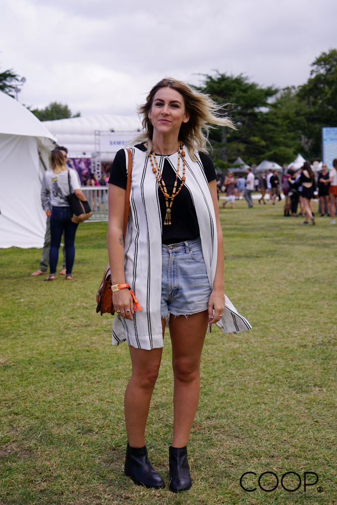 Katie wears customised Glassons vest, vintage jean shorts and necklace.