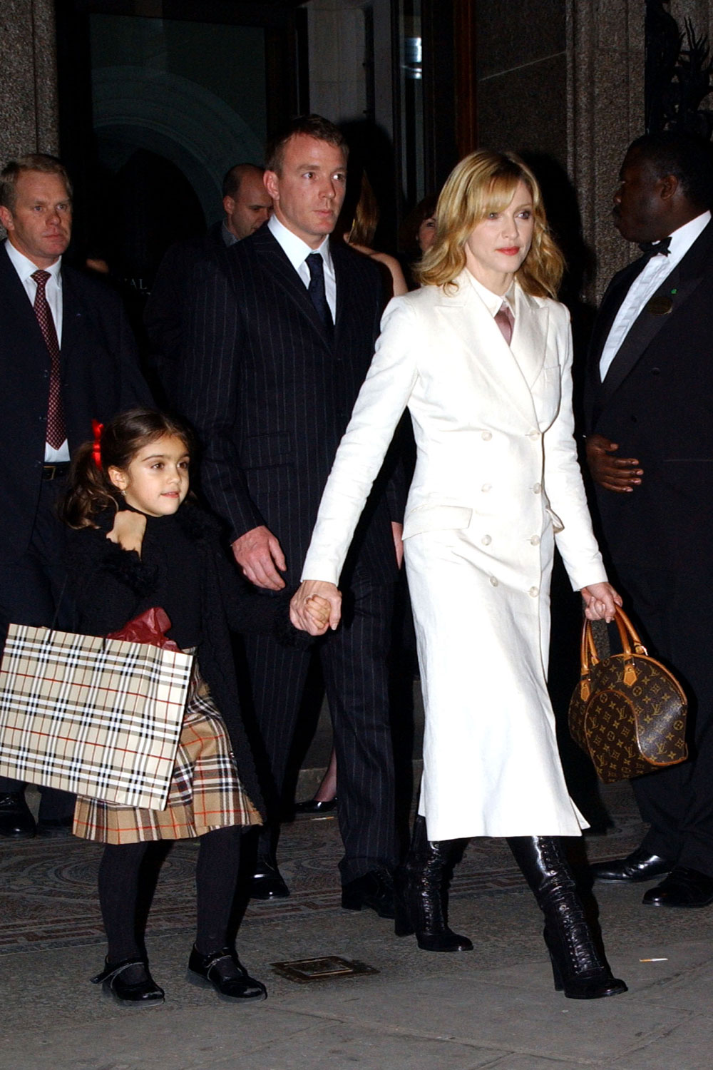 Madonna, Guy Ritchie and daughter Lourdes, London, 2002.