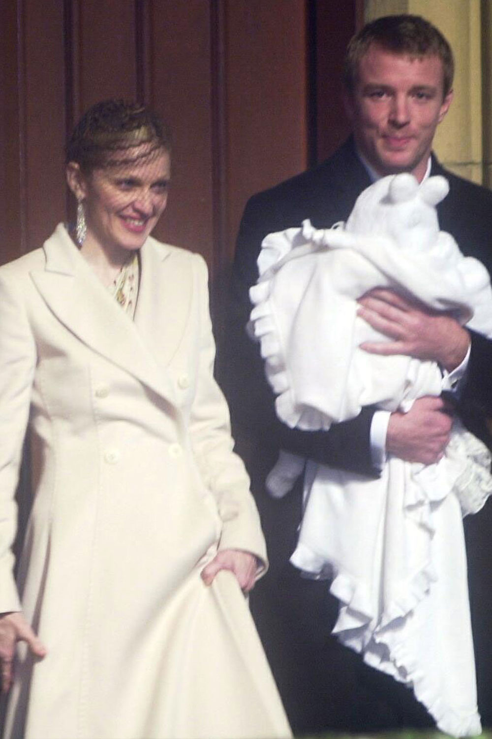 Madonna and Guy Ritchie at the baptism of son Rocco, Scotland, 2000.