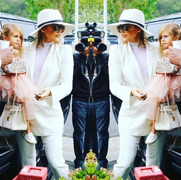 Khloe Kardashian shared this paparazzi snap of her and her adorable niece Penelope on their way to Easter church service.