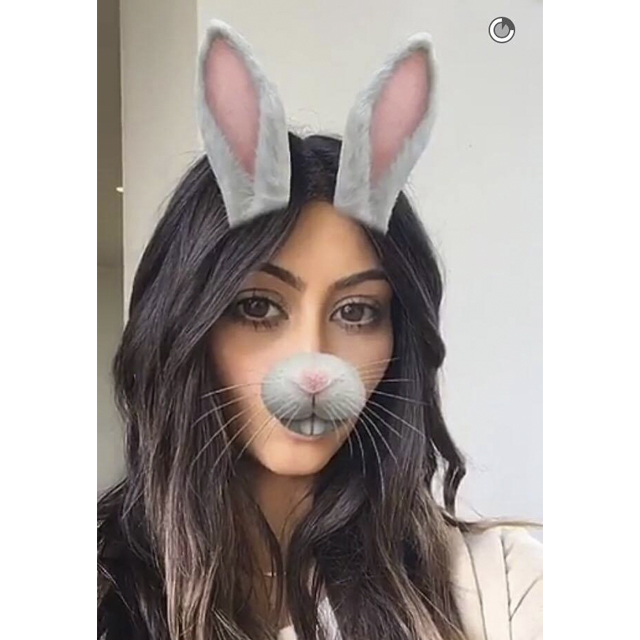 Selfie queen Kim Kardashian posed as a cute grey Easter Bunny on Snapchat.