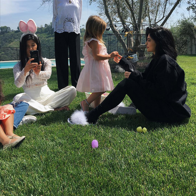 Kylie Jenner shared this snap on Instagram celebrating the holiday in typical extravagant Kardashian fashion at her sister Kourtney's house.