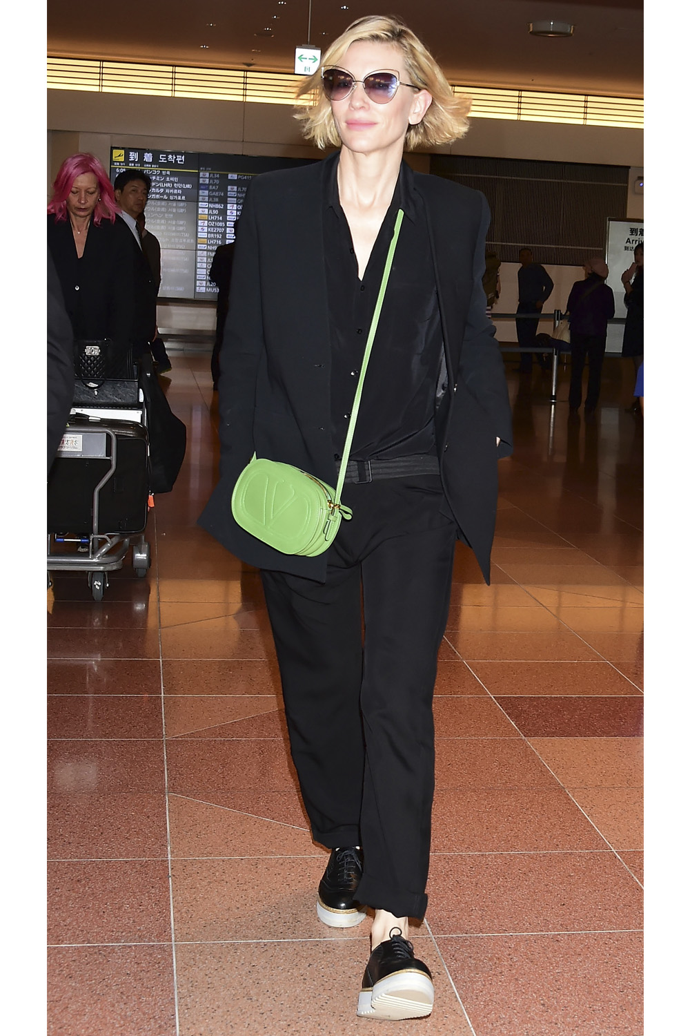 Cate Blanchett goes for head to toe black as she arrives at Haneda Airport in Japan.