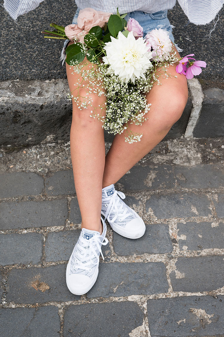 Lucy Houghton of Lu Diamond Flowers wears Converse Chuck IIs
