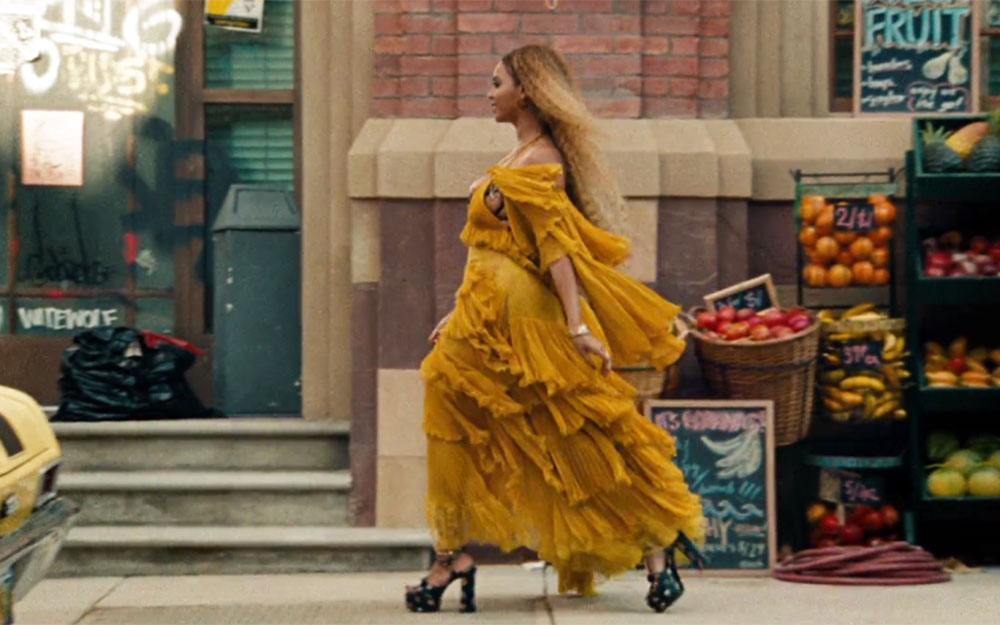 Beyonce wears Roberto Cavalli AW16 dress and Saint Laurent platforms