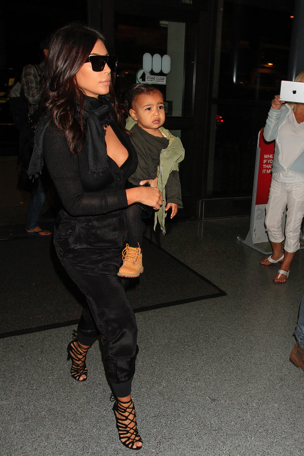 Timberlands and khaki bomber jackets at LAX, August, 2014.