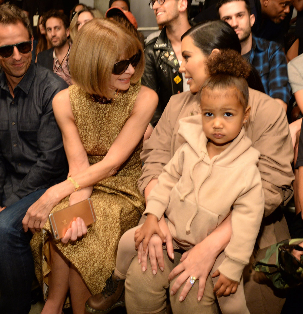 Anna, mommy and me in matching camel at Daddy's Yeezy Season 2 show during New York Fashion Week, September 2015.