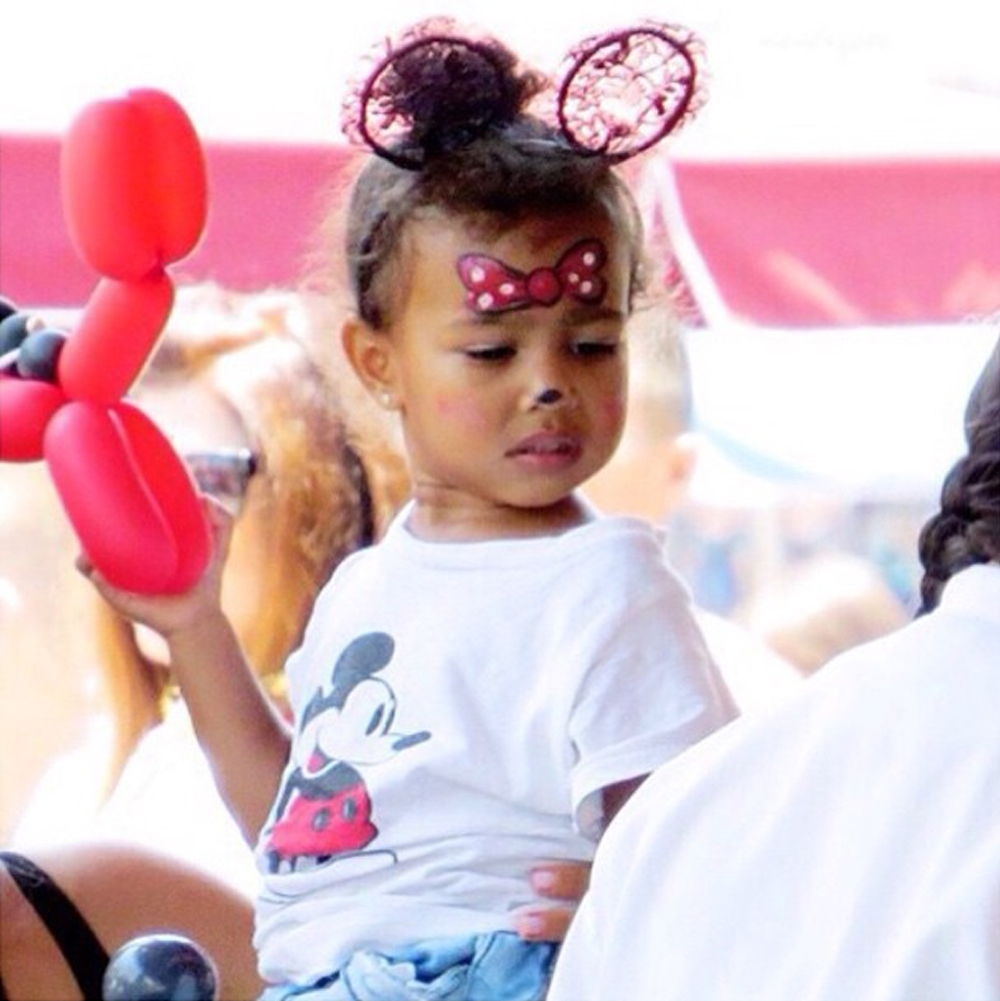 Channeling my inner Minnie Mouse at my second birthday party at Disneyland, June 2015.