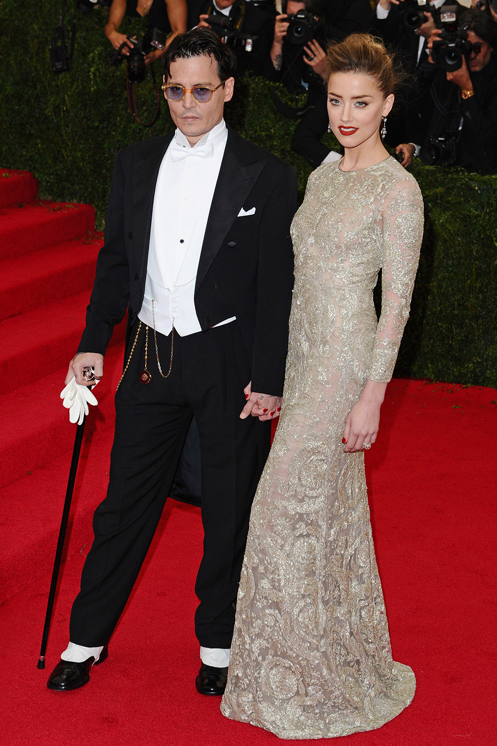 Johnny and Amber look every inch the Hollywood couple at the 2014 Costume Institute Gala at the Metropolitan Museum of Art celebrating the Charles James: Beyond Fashion exhibit in May, 2014.