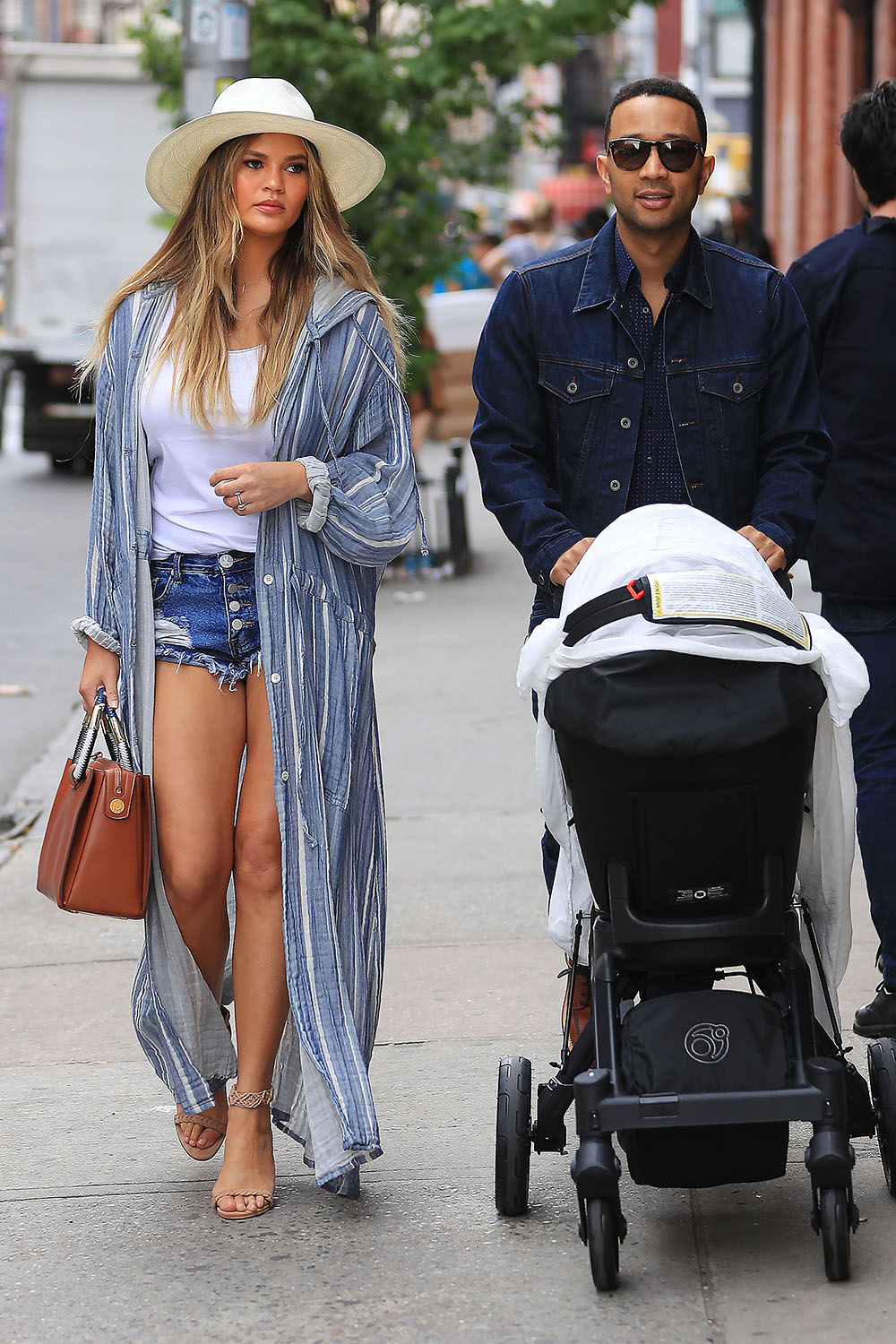 Victoria Secret Angel and new mum Chrissy Teigen looked chic and effortless out and about in New York with her husband John Legend and newborn daughter Luna.
