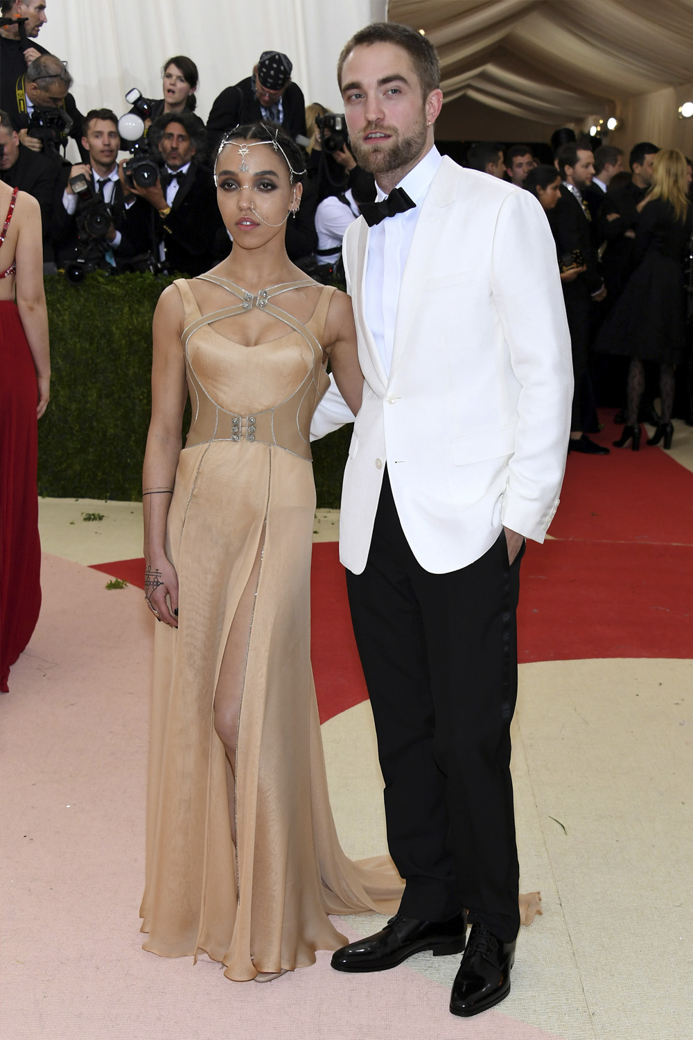 FKA twigs in Atelier Versace and Robert Pattinson in Dior Homme