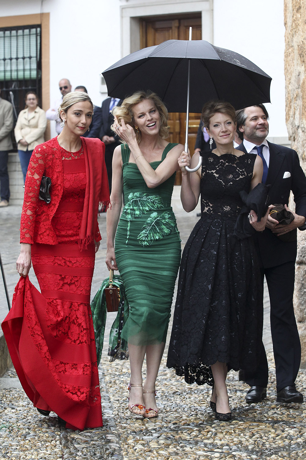 Eva Herzigova and friends attend the wedding of Lady Charlotte Wellesley and Alejandro Santo Domingo.