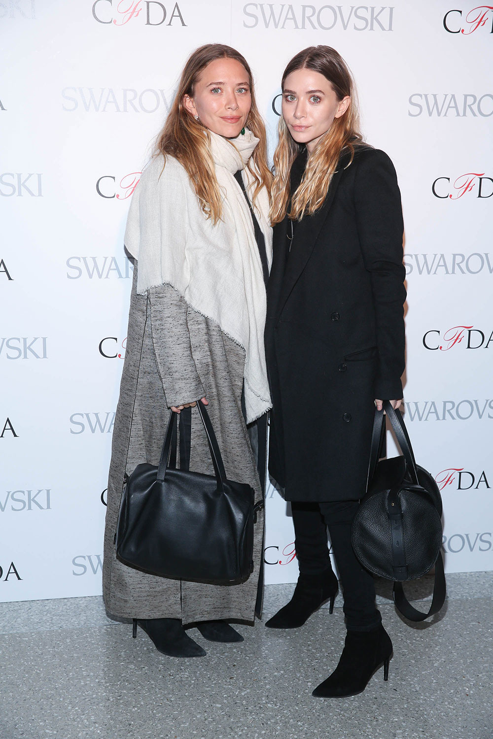 Mary-Kate and Ashley Olsen at the 2015 CFDA Fashion Awards Announcement Party