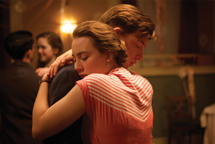 A stills shot from the set of Brooklyn, starring Saoirse Ronan as Eilis and Emory Cohen as Tony. 