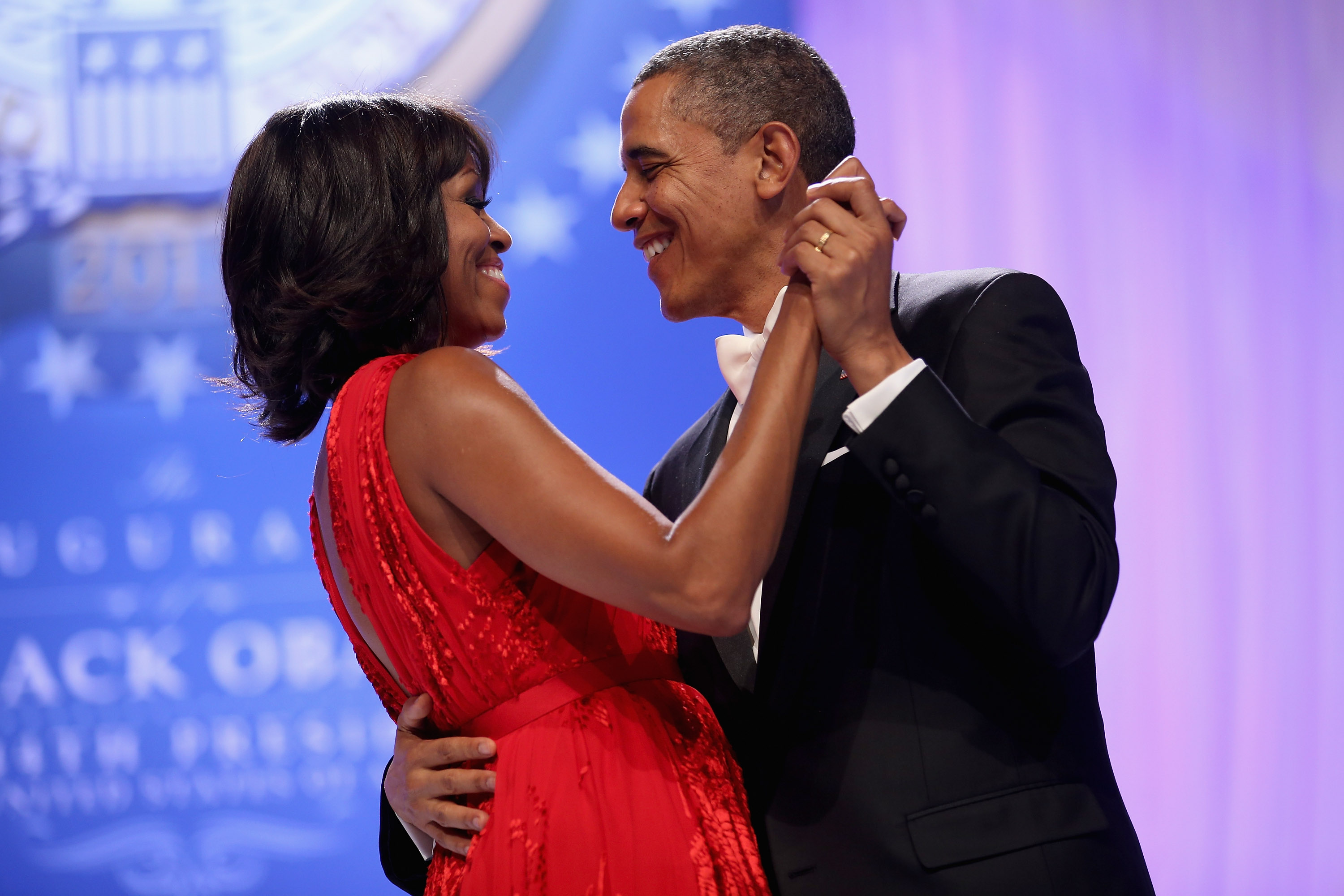 WASHINGTON, DC - JANUARY 21: U.S. President Barack Obama and first lady Michelle Obama dance together during the Comander-in-Chief's Inaugural Ball at the Walter Washington Convention Center January 21, 2013 in Washington, DC. Obama was sworn-in for his second term of office earlier in the day. (Photo by Chip Somodevilla/Getty Images)