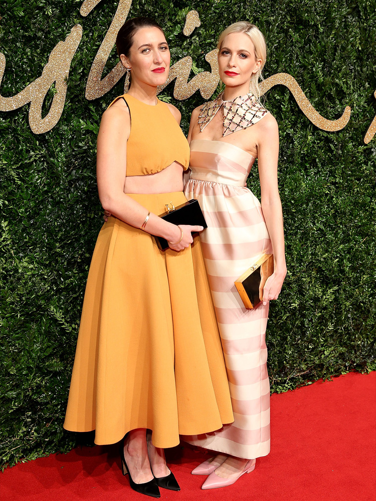 Emilia with Poppy Delevingne at the 2015 British Fashion Awards.