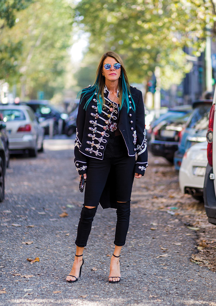 Anna dello Russo wearing a Dolce & Gabbana blazer and ripped denim jeans outside Marni during Milan Fashion Week SpringSummer 2017 on September 25, 2016