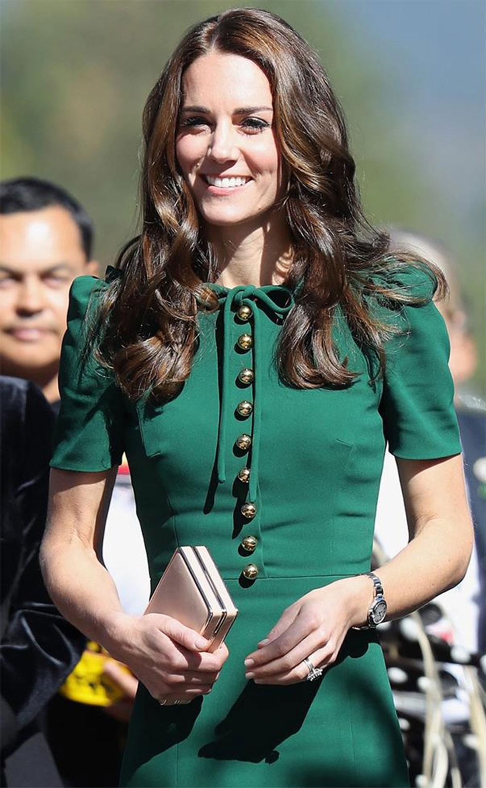 Day 4: The Duchess opted for an emerald-green Dolce & Gabbana dress to visit the University of British Columbia.