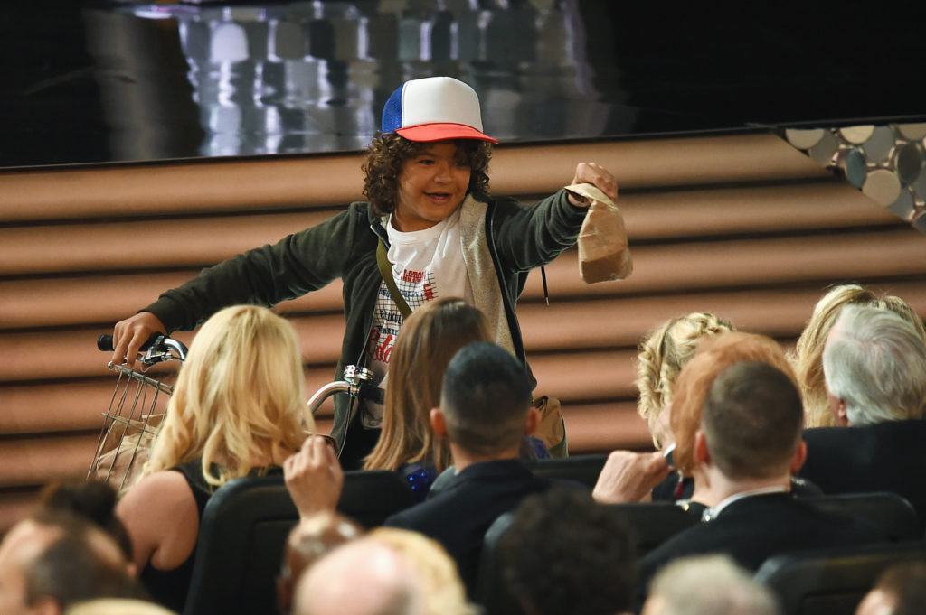 LOS ANGELES, CA - SEPTEMBER 18:  Actor Gaten Matarazzo passes out peanut butter and jelly sandwiches to the audience during the 68th Annual Primetime Emmy Awards at Microsoft Theater on September 18, 2016 in Los Angeles, California.  (Photo by Kevin Winter/Getty Images)
