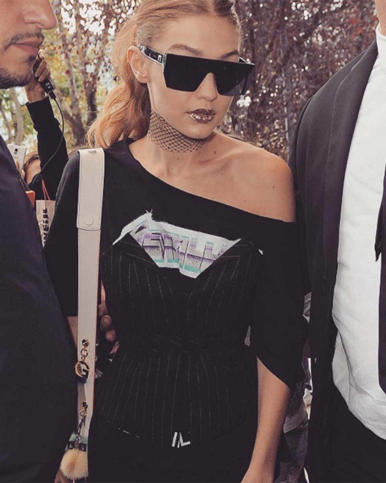 Gigi Hadid wears corset over tee at Milan Fashion Week