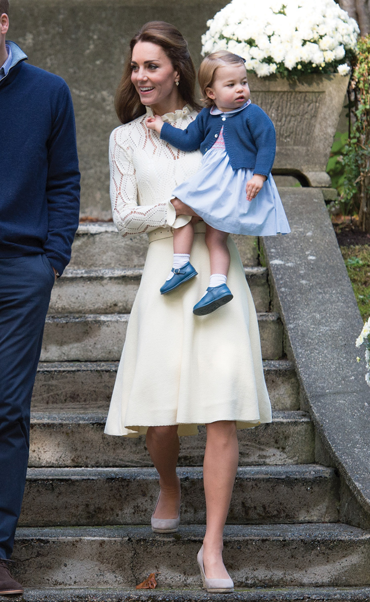 The Duchess looked chic on day six, playing with her children in a chic cream See By Chloe dress at a children's party for Military families.
