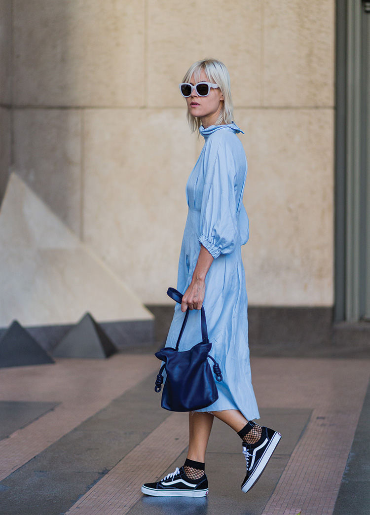 Linda Tol wearing a blue dress outside Ferragamo during Milan Fashion Week SpringSummer 2017 on September 25, 2016.
